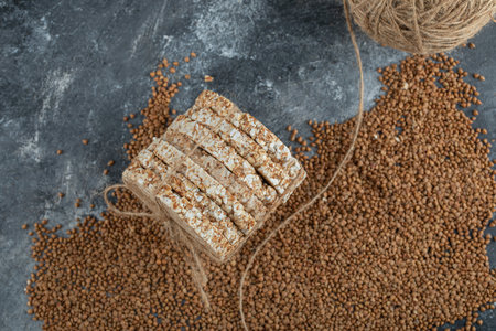 Stack of rice cake tied with rope on marble background
