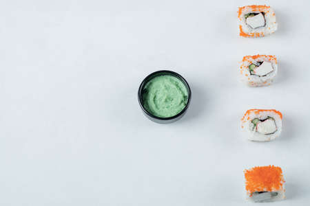 Sushi rolls with red caviar and wasabi sauceの写真素材