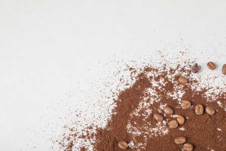 Coffee beans on the blended coffee or cocoa powderの写真素材