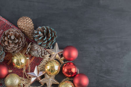 Mix of colorful oak tree ornaments on a dark background