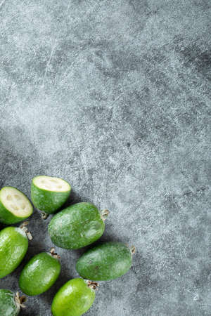 Fresh feijoa fruits on marble wooden backgroundの写真素材