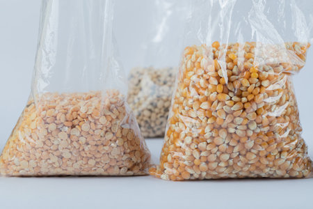 Different kinds of raw beans on a gray backgroundの写真素材