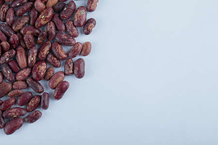 Many grains of dried beans on a white backgroundの写真素材