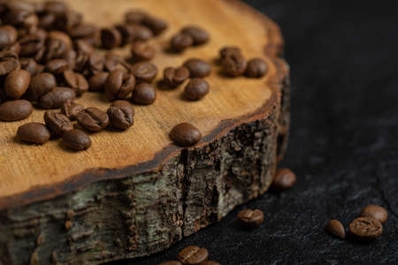 Some of coffee beans on a wooden board. High quality photoの写真素材