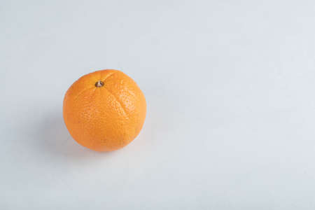 Fresh orange fruit isolated on a white background
