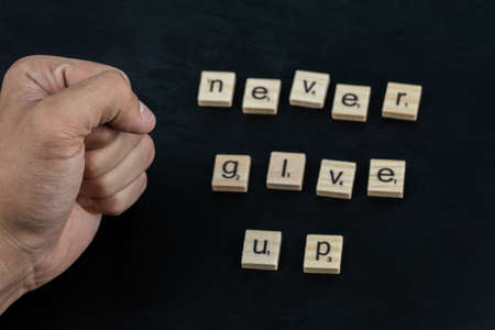 Inspirational quote embedded on the black boardの写真素材