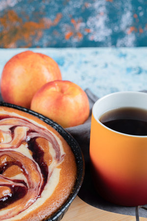 Sweet yummy pie served with a cup of coffeeの写真素材