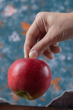 Apples isolated on blue textured background