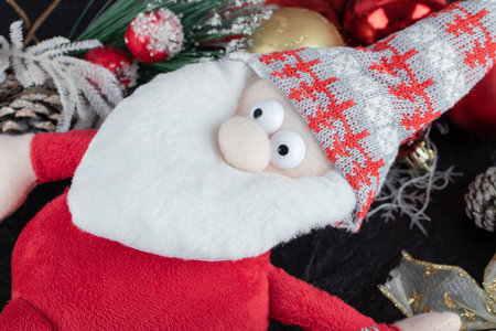 Christmas decorations and Santa figurines on dark backgroundの写真素材
