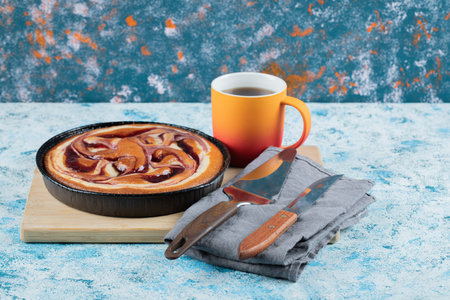 Sweet soft pie served with a cup of coffeeの写真素材