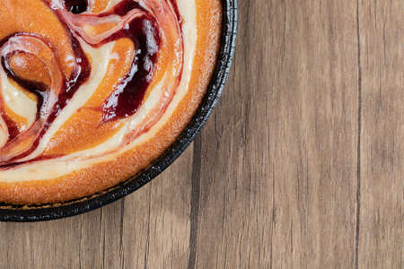 Strawberry pie in a black metallic panの写真素材