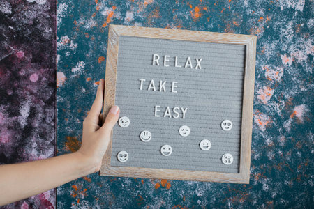 Motivational and inspirational quote on a grey rustic board