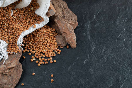 Brown kidney beans isolated on a dark backgroundの写真素材