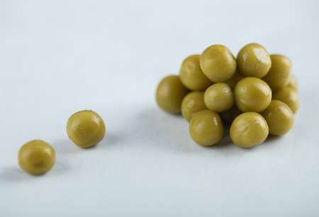 Pile of marinated Greek olives on white backgroundの写真素材