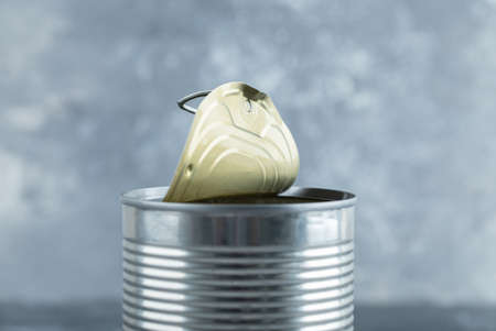 Close up photo of opened tin green olivesの写真素材