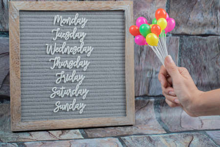 Name of weekdays embedded on grey backgroundの写真素材