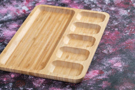 A breakfast board with multiple pieces inside