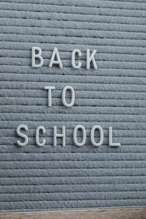 Back to school phrase embedded on grey backgroundの写真素材