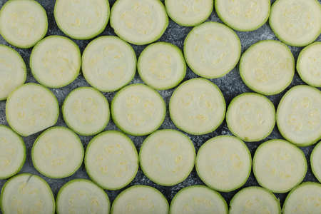Pile of zucchini slices. Zucchini backgroundの写真素材