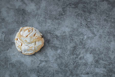 Fluffy meringue muffins on grey backgroundの写真素材