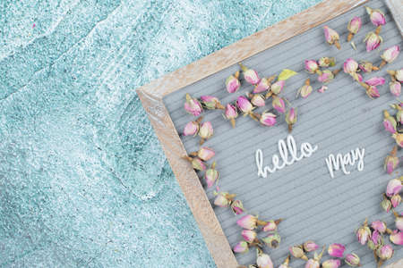 Happy may poster with flower blossoms aroundの写真素材