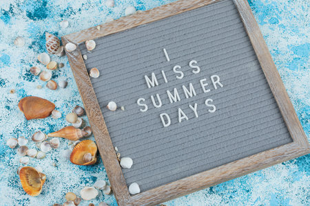 Motivational quote embedded on a grey boardの写真素材