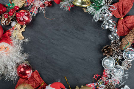 Christmas wreath with festive ornaments on dark backgroundの写真素材