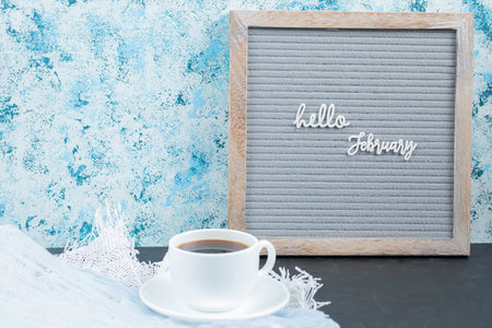 Hello month names on the board with a cup of drink aroundの写真素材