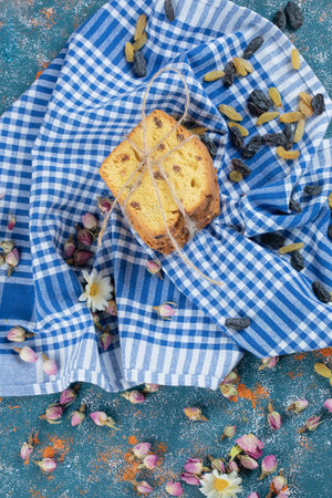 Sultana pie slices on a blue checked towelの写真素材