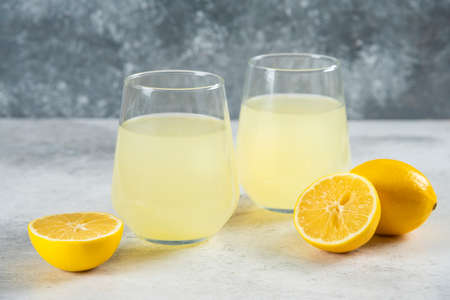Two cups of fresh lemonade with lemon slicesの写真素材