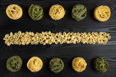 Italian pasta varieties on the black table
