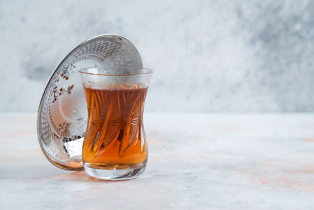 Glass of tea on white background macro viewの写真素材