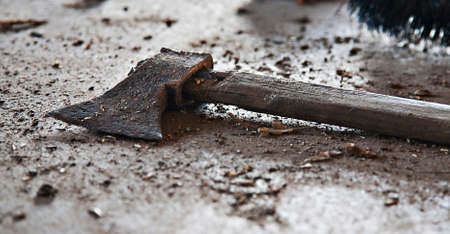 unused axe left alone on table with chopsの写真素材