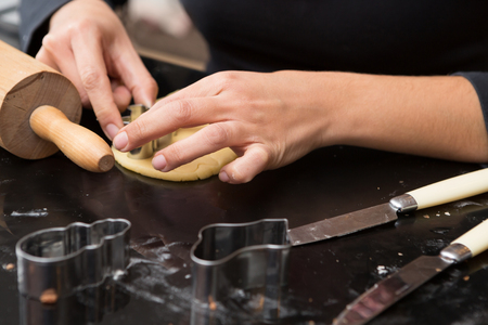 Hands Forming Dough For Baking Homemade Treatsの写真素材