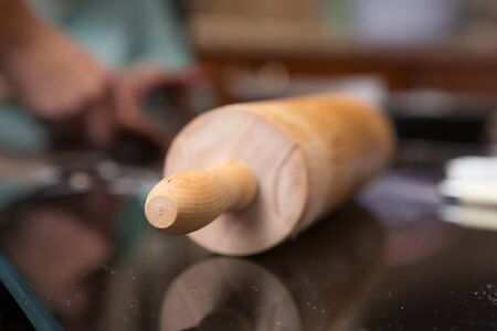 Rolling Pin On The Table In The Process Of Bakingの写真素材
