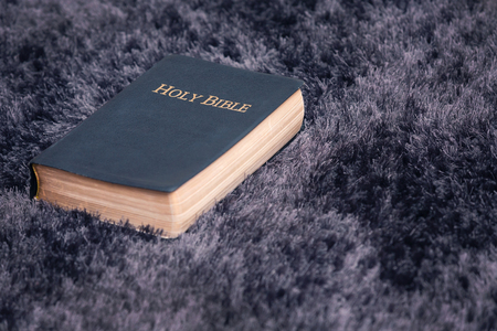 Top View of Holy Bible On Dark Texture