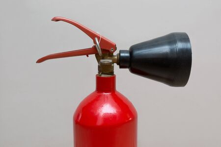 Home Fire Extinguisher with Red Base and Black Nozzleの写真素材