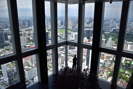 Bangkok, Thailand, 08.20.2019: Indoor 360-Degree Observation Deck with spectacular view of Bangkok on the 74th floor of King Power MahaNakhon skyscraper in the Silom/Sathon central business districtのeditorial素材
