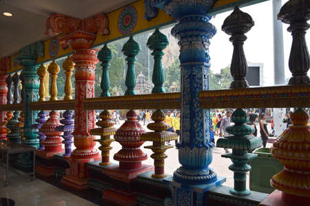 Gombak, Selangor, Malaysia 08.14.2019: A small Hindu worship place decorated with stunningly vibrant colorful Dravidian architecture elephant, deity statues, pillars at Batu Cavesのeditorial素材