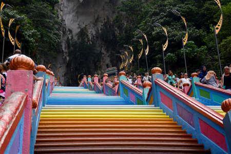 Gombak, Selangor, Malaysia 08.14.2019: Beautiful 272-step staircase to Batu Caves painted, decorated with stunning vibrant colorsのeditorial素材
