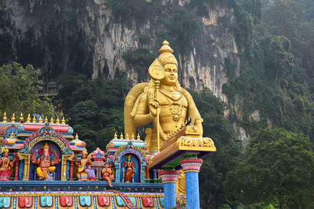 Gombak, Selangor, Malaysia 08.14.2019: The Giant and amazing golden Murugan statue protecting the...