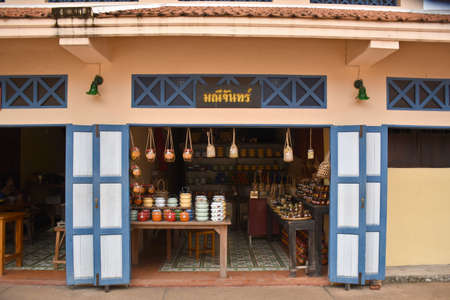 Kanchanaburi, Thailand, 09.09.2019: A small vendor store selling handmade food containers and traditional Thai beers in the Ancient Market Zone in the heritage village Mallika City R.E. 124のeditorial素材