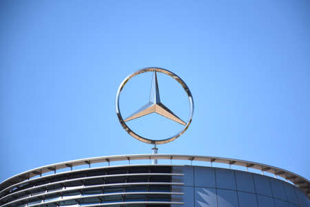 Milano, Italy, 08.04.2019: Mercedes-Benz three-pointed star logo on top of Headquarter building complex of Merbag - Official Mercedes-Benz Dealership in Uptown Milan, the first Smart District of Milanのeditorial素材