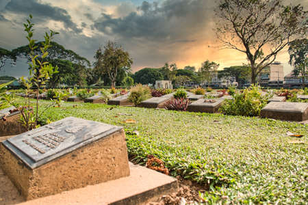 Kanchanaburi, Thailand 12.28.2019: Kanchanaburi War Cemetery or Don-Rak War Cemetery is the main prisoner of war (POW) cemetery for victims of Japanese imprisonment while building the Burma Railway.のeditorial素材