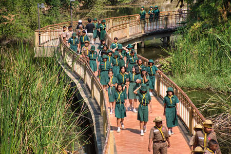 Ratchaburi, Thailand 12.22.2019: Thai Girl Guides (Girl Scouts) in the Khao Ngu Rock Park, the name...