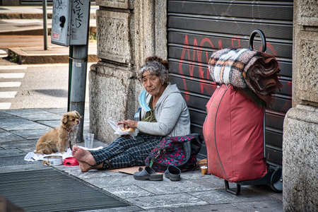Milan, Italy 08.08.2020: Homeless people on the streets of Milan
