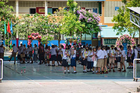 Bangkok, Thailand 04.07.2021 Thai children on a break on the courtyard of Watpakbor Schoolのeditorial素材