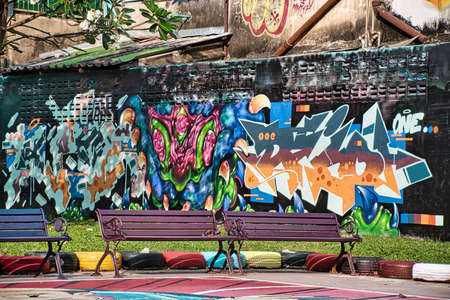 Bangkok Thailand 12.20.2021 Chalerm La Park a small enclosed square with a sports court and a...