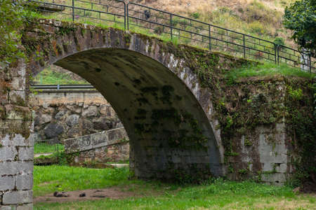 Bridge full of mold and green in a park on the outskirts of the town of CabezÃ³n de Salの写真素材