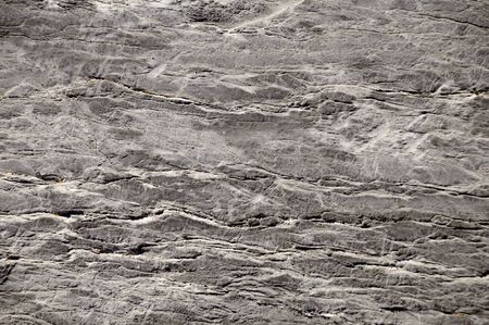 Cracked rock surface texture seamlessly tileableの写真素材
